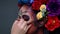 Closeup portrait of a woman with a skull makeup dressed with flower crown