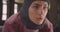 Closeup portrait of young motivated athletic muslim female in hijab working out in gym indoors
