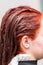 Closeup profile view on woman head after applying hair color dye