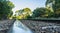 Closeup of rail track with tree reflection.