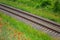 Closeup railroad among green fields