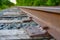 Closeup of railroad spikes and ties