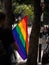 Closeup of rainbow flag at LGBTQI march gay parade pride celebration event in streets of Medellin Colombia South America