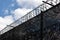 Closeup of razor wire boarder wall