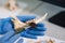 Closeup of rchaeologist working in natural research lab. Laboratory assistant cleaning animal bones. Close-up of hands