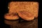 closeup rectangular ray bread with and two cereal flapjacks
