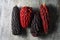 Closeup of red and black heirloom corn cobs