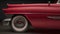 Closeup of red classic car. Transport auto wheels. Luxury vehicle. Old sport model.