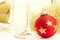 Closeup of a red dull christmas ball with champagn