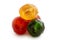 Closeup of red, green and yellow glace cherries isolated on whit