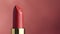 closeup of red moisturizing lipstick