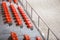 Closeup of red sport stadium seats. Empty stand. Team sport supporter