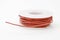 Closeup of red wire spool