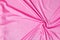 Closeup rippled soft pink fabric