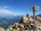 Closeup of road signs in mountains on the scenic mountainscape background,  hiking Dolomite Alps