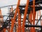 Closeup on Rollercoaster Construction with Orange Steel