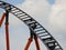 Closeup on Rollercoaster Construction with Orange Steel