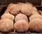 Closeup of a round pastry bun on a pan