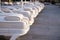 Closeup row of comfortable loungers near the swimming pool