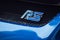 Closeup of RS sign on blue Ford Focus RS front parked in the street