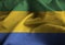 Closeup of Ruffled Gabon Flag, Gabon Flag Blowing in Wind