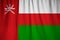Closeup of Ruffled Oman Flag, Oman Flag Blowing in Wind
