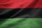 Closeup of Ruffled Pan African Flag, Pan African Flag Blowing in Wind