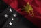 Closeup of Ruffled Papua New Guinea Flag, Papua New Guinea Flag Blowing in Wind