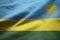 Closeup of Ruffled Rwanda Flag, Rwanda Flag Blowing in Wind