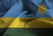 Closeup of Ruffled Rwanda Flag, Rwanda Flag Blowing in Wind