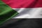 Closeup of Ruffled Sudan Flag, Sudan Flag Blowing in Wind