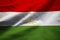 Closeup of Ruffled Tajikistan Flag, Tajikistan Flag Blowing in Wind