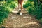 Closeup runner shoe on park trail