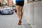 Closeup runners legs with urban city background