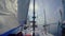 Closeup of sailing yacht in the sea, movement, speed, regatta