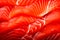 Closeup of the salmon slices with a red streaked texture. Macro photo of natural Atlantic Norwegian trout fillet