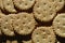 Closeup of salted crackers. Background image of classic salty cracker on a brown wooden tabl
