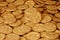 Closeup of salted crackers. Background image of classic salty cracker on a brown wooden tabl