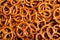 Closeup salted pretzel seamless background