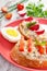 Closeup of sandwiches or baguette with mackerel or tuna fish paste on plate, healthy nutrition