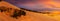 Closeup sandy desert dune on the dramatic sunset background