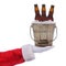 Closeup of santa holding a bucket with three beer bottles over a white background