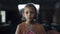 Closeup scared girl standing empty school hall. Teen child holding notebook.