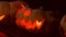 Closeup of scary halloween carved glowing pumpkins
