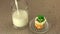 Closeup scene of delicious cupcake with a glass of milk