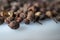 Closeup and selective focus of dried Sichuan pepper seeds genus Zanthoxylum