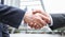 Closeup Shaking hands deal success good job. Meeting, negotiation, greeting or welcome to business partners. Partnership or