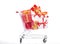 Closeup shopping cart with gift box