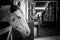 Closeup shot of an adorable horse in a stable in grayscale