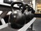 Closeup shot of aligned kettlebells in a gym
